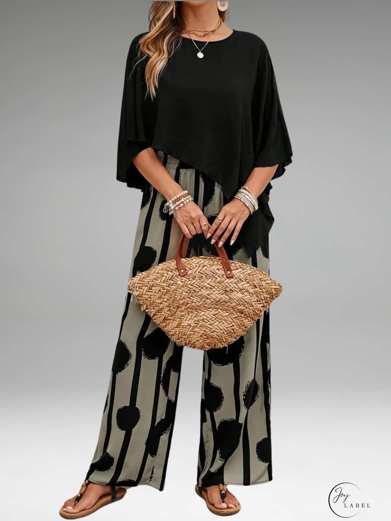 Mila | Haut asymétrique tendance pour femmes avec ensemble de pantalon à imprimé stylé