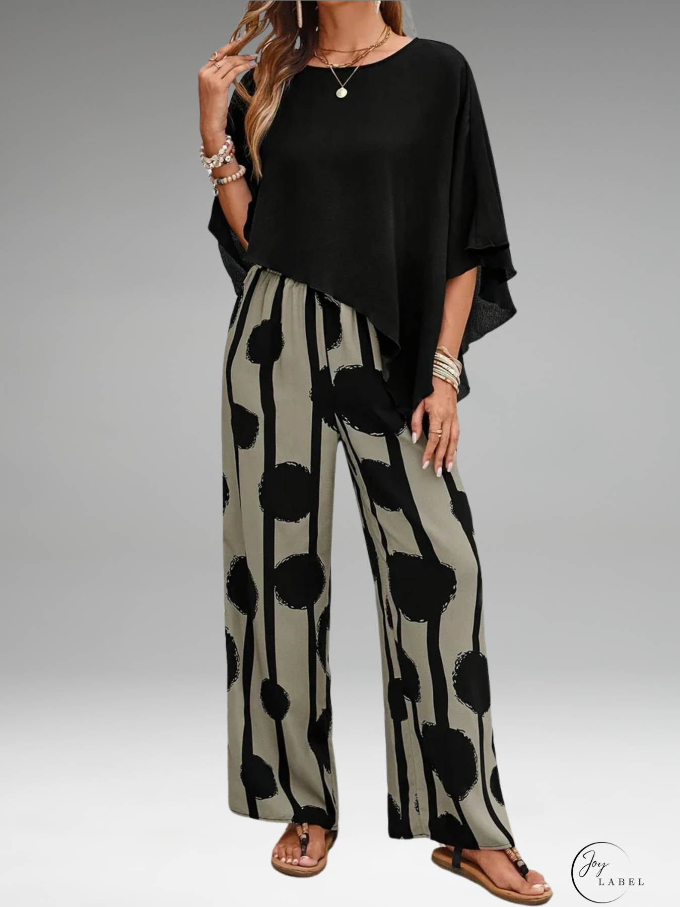 Mila | Haut asymétrique tendance pour femmes avec ensemble de pantalon à imprimé stylé