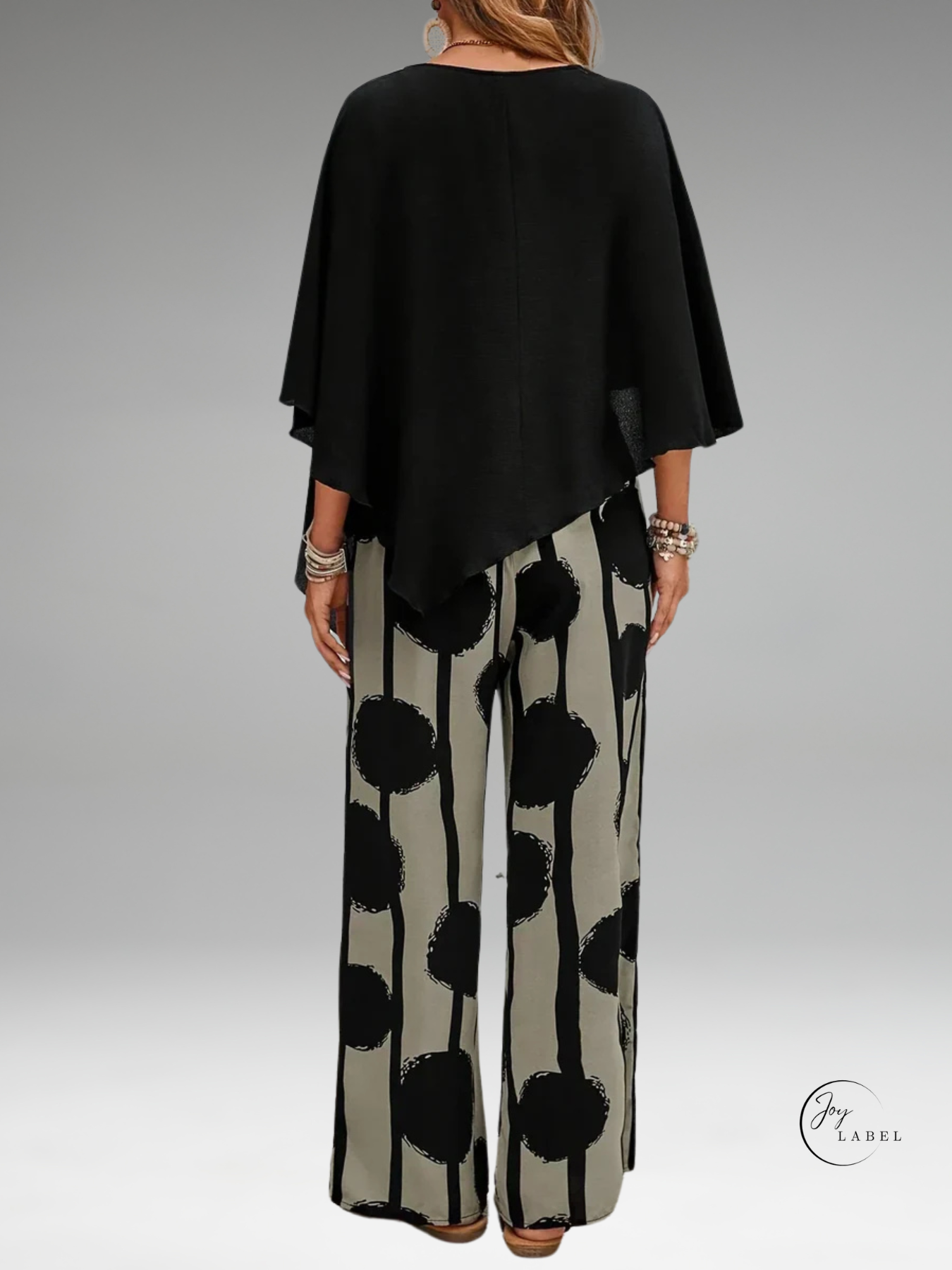 Mila | Haut asymétrique tendance pour femmes avec ensemble de pantalon à imprimé stylé